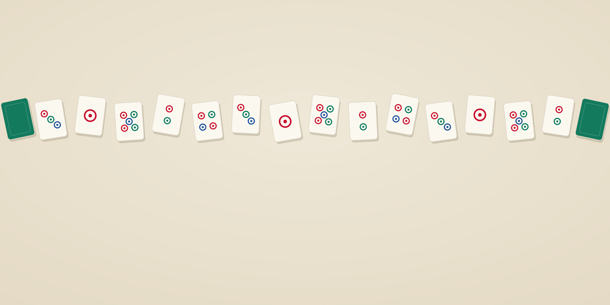 Mahjong tiles laid out on a warm ivory ground